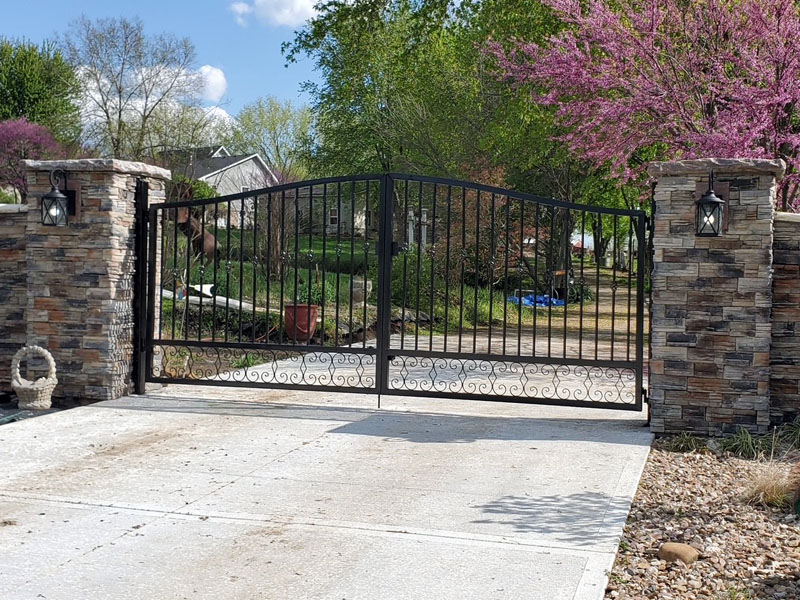 Custom iron residential entrance gate creation by Y&R Construction.